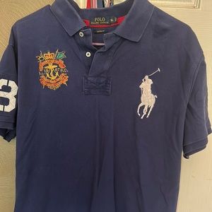 Navy blue polo shirt by Ralph Lauren. Size XL. Fits true to size.